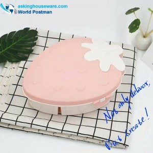 Eper alakú cukorka és dinnyemag-tartály