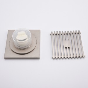 Sárgarézia a garázs padlójának lefolyófedőit