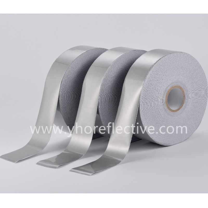 Y-2001 Reflektív elasztikus szövet –egyarcú