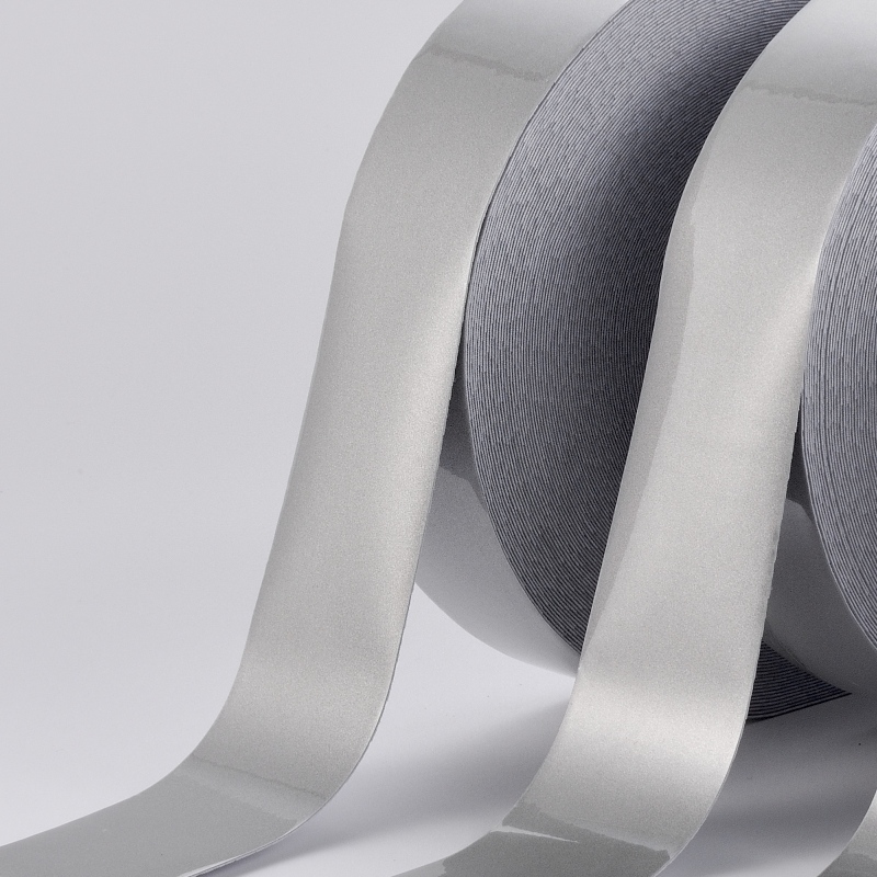 Y-2001 Reflektív elasztikus szövet –egyarcú