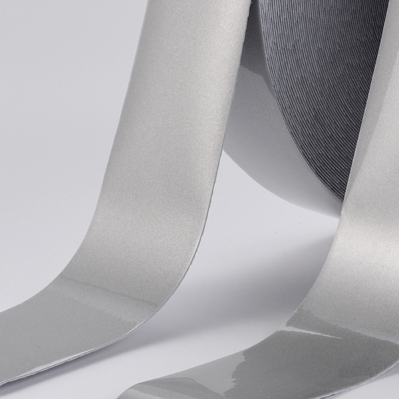 Y-2001 Reflektív elasztikus szövet –egyarcú