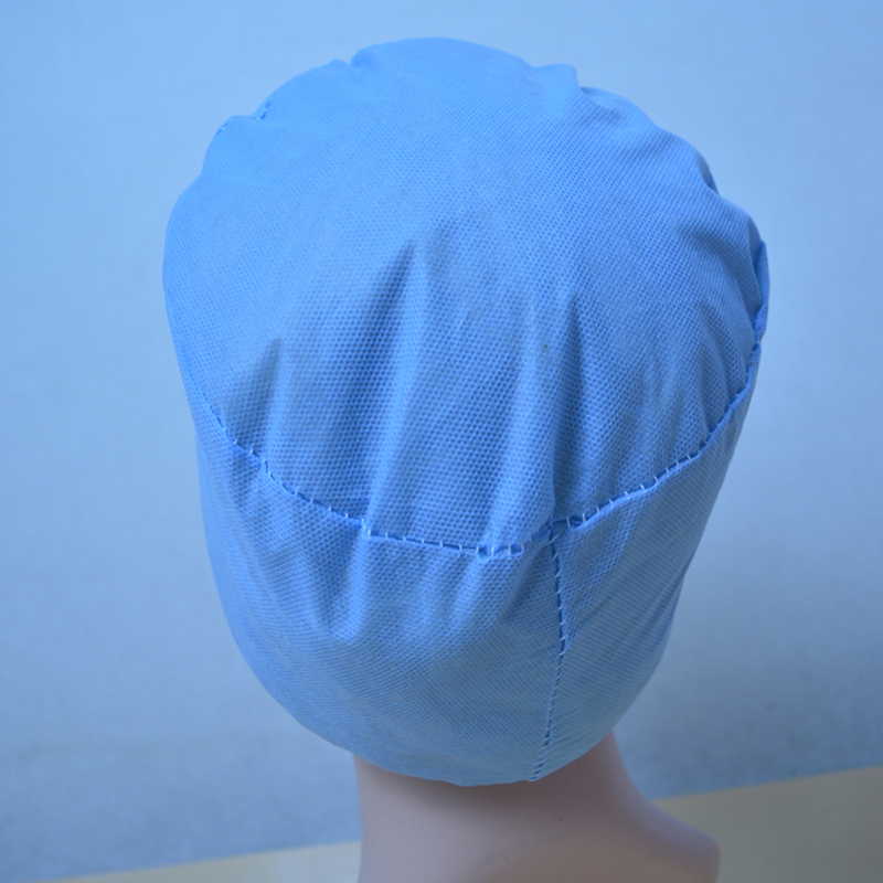 Eldobható sebészeti sapka
