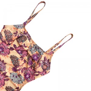 A gyerekek fürdőruhájanyomtatott kötőfékkel üreges